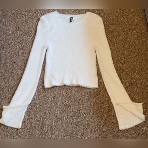 Divided cropped fuzzy sweater